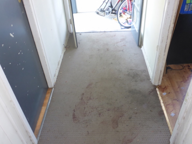 blood on the entrance of a house